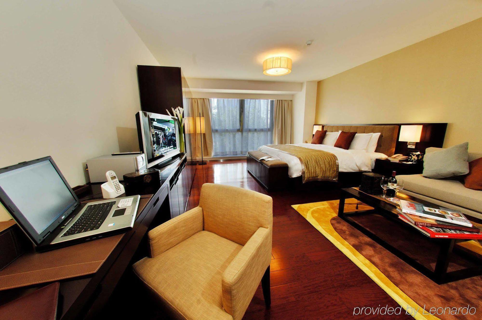 Oak Chateau Beijing Pequim Quarto foto